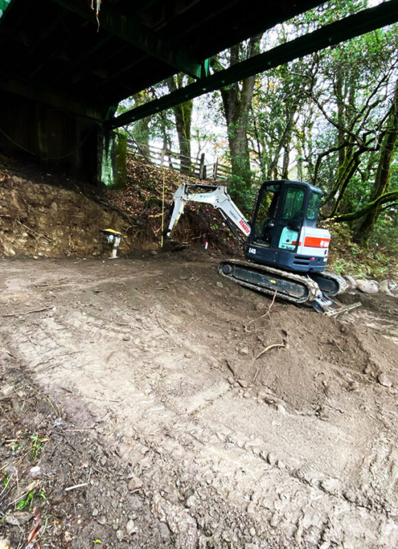 Underbridge slope grading and erosion control project by VEK Construction — securing soil and protecting infrastructure in Northern California.