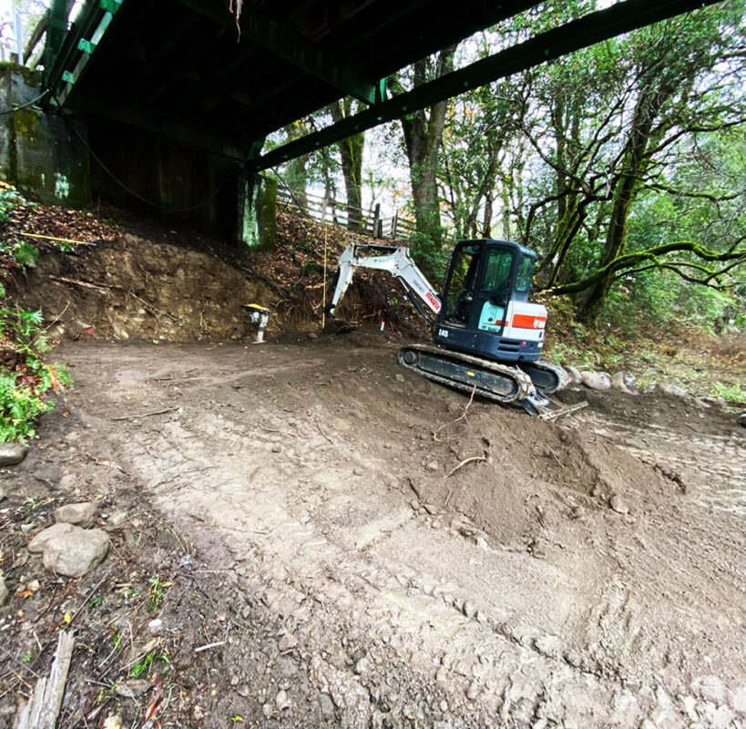 Underbridge slope grading and erosion control project by VEK Construction — securing soil and protecting infrastructure in Northern California.