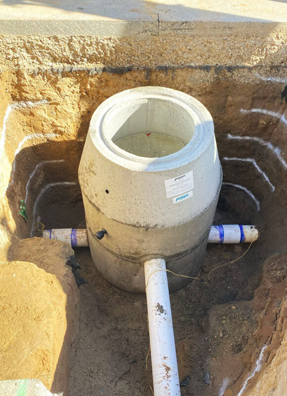 Concrete catch basin and storm drain system installation by VEK Construction — expert underground utility and drainage work in Sacramento.